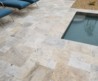 Pool deck materials Las Vegas homeowners compare, stamped concrete and travertine